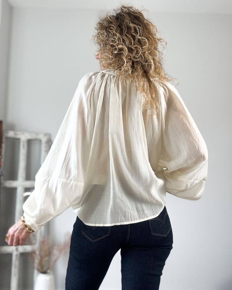 Blusa cream abullonada