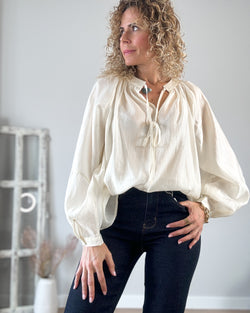 Blusa cream abullonada